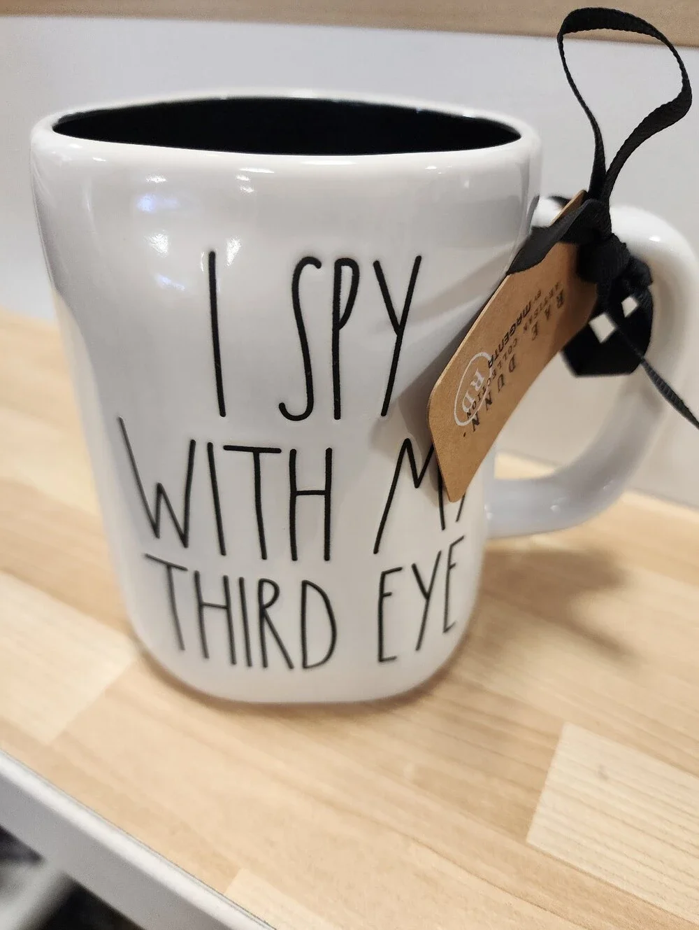 Rae Dunn White Ceramic Mug with Black Interior and Text